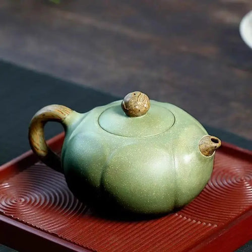 Théière chinoise en argile yixing motif lotus artisanale