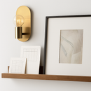 Minimalist gold wall light