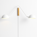 Minimalist Scandinavian wall light with swivel arm for interior decor