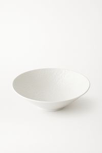 Minimalist rock-effect ceramic bowl for versatile kitchen use