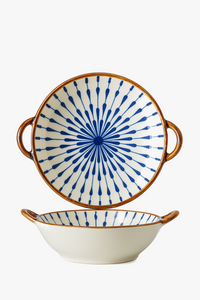 Japanese ceramic bowl with handle and floral pattern