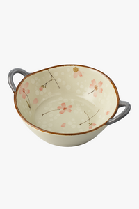 Japanese ceramic bowl with handle and floral design