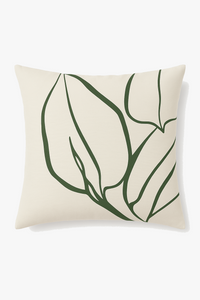 coussin décoratif à motif végétal vert pour un intérieur élégant