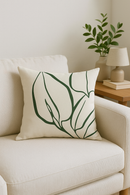 coussin décoratif à motif végétal vert pour un intérieur élégant