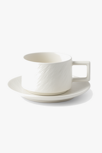 Minimalist ceramic cup and saucer set durable design
