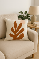 housse de coussin carrée motif géométrique marron élégant