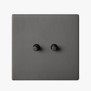 interrupteur-double-2-voies-en-acier-gris-fonc-bross-0.png