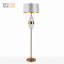 lampadaire-design-nordique-en-tissu-fer-et-cristal-0.png