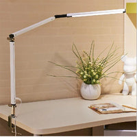 lampe de bureau led créative bras pivotant et intensité variable