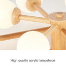 lustre-en-bois-nordique-avec-boule-de-verre-d-corative-5.png