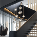 lustre en cristal design luxueux pour escalier colimaçon moderne