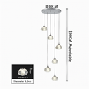 lustre en cristal design luxueux pour escalier colimaçon moderne