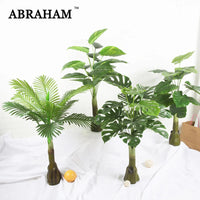 Realistic artificial tropical plants for interior decoration
