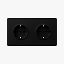 prise-lectrique-double-europe-en-acier-noir-mat-bords-arrondis-0.png