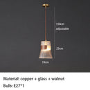 suspension-moderne-en-verre-transparent-avec-d-tails-en-bois-et-cuivre-7.png
