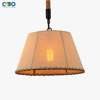 Vintage pendant light in hemp rope and iron for cafés and bars