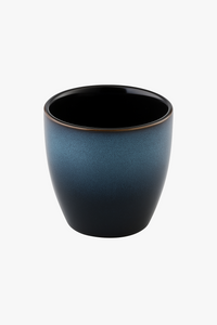 Minimalist Japanese stoneware tea cup