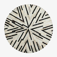 Tapis moderne rond aux formes géométriques noires et blanches Skin