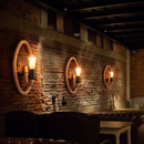 Rustic wall light with round vintage rope