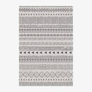 Tapis rectangle aux motifs géométriques noirs et beiges style Keecy