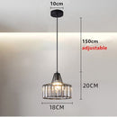 Suspension design avec abat-jour en verre ambré Cloarec