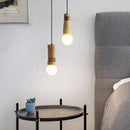 Suspension LED de formes cylindriques en bois avec bracelet simili cuir