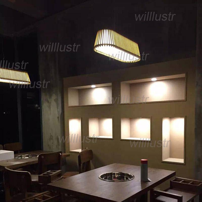 Lustre LED long avec barres en bambou
