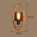 Rustic wall light with round vintage rope