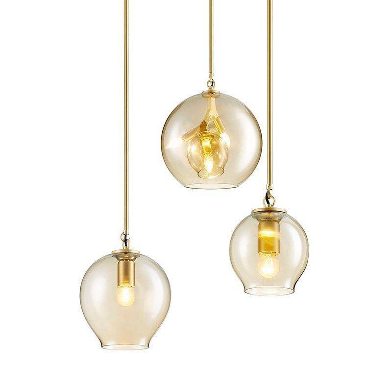 Suspension design LED en verre cristal et anneaux dorés
