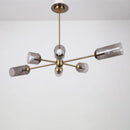 Lustre design doré et abat-jour en verre fumé Hotel