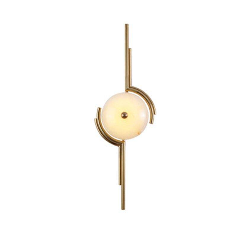 Applique murale design avec cercle en marbre et tiges dorées