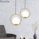 Suspension design à LED anneau doré et verre Indoor