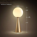 Lampe à poser design LED conique avec boule en verre