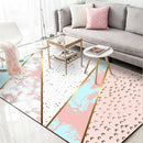 Tapis rectangle rose et doré style géométrique