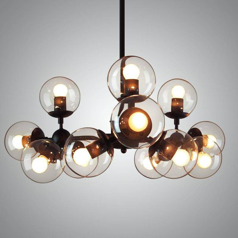 Suspension design avec lampe dans boule de verre