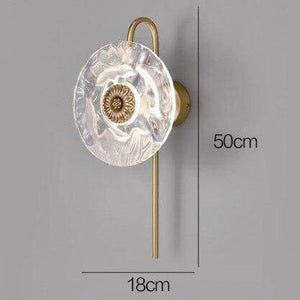 Designer LED wall light with floral patterned glass disc