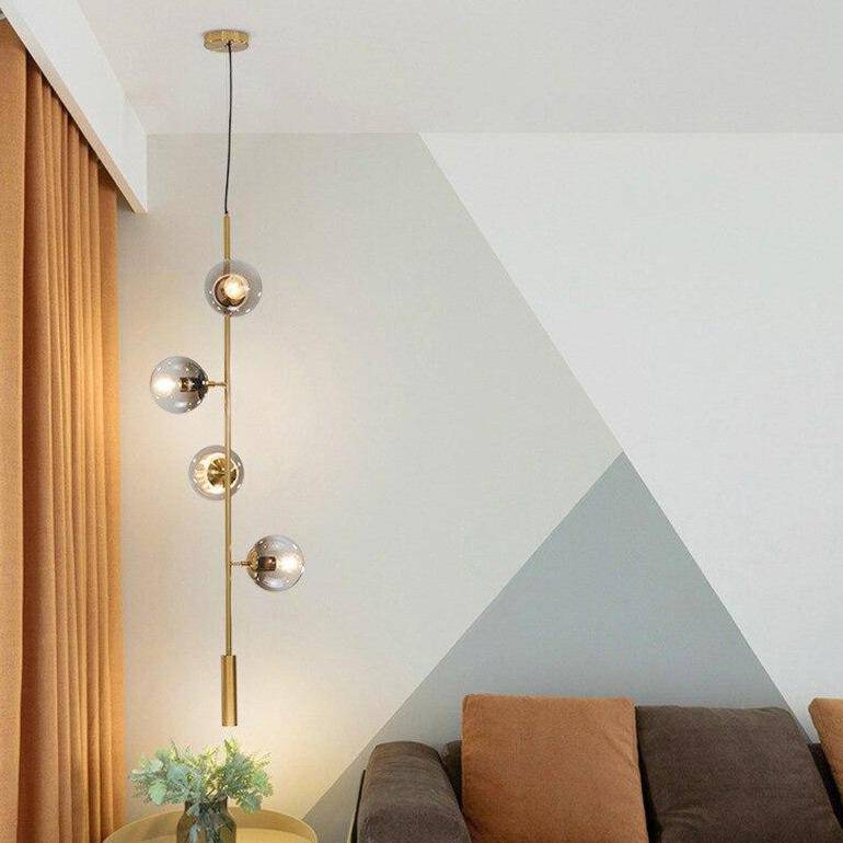 Suspension design LED allongée avec plusieurs abats-jour métal