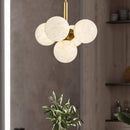 Suspension design LED dorée avec boules en marbre
