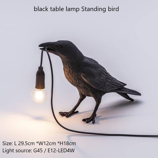 Applique murale LED avec oiseau qui tient une lampe dans son bec