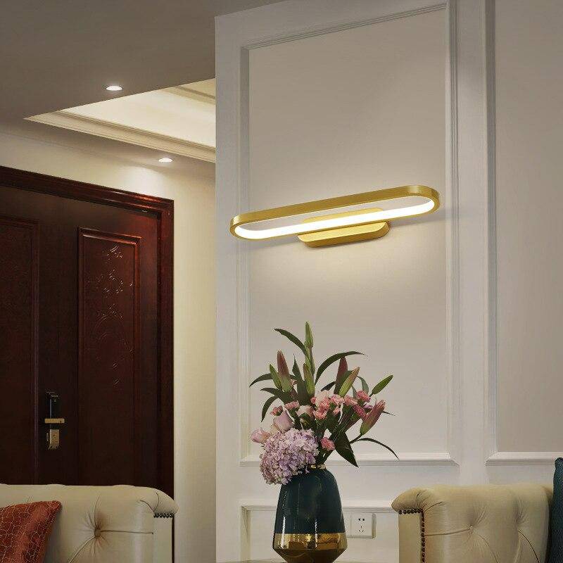 Applique murale design à LED aux formes arrondies dorées
