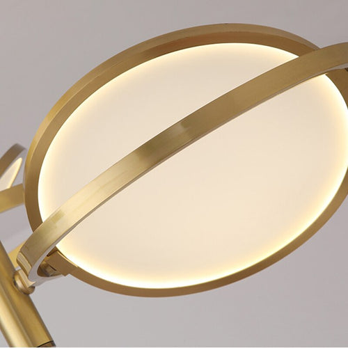 Lustre design en métal doré avec lampe arrondie Skalla