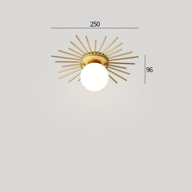 Plafonnier moderne avec boule en verre et métal doré Joha