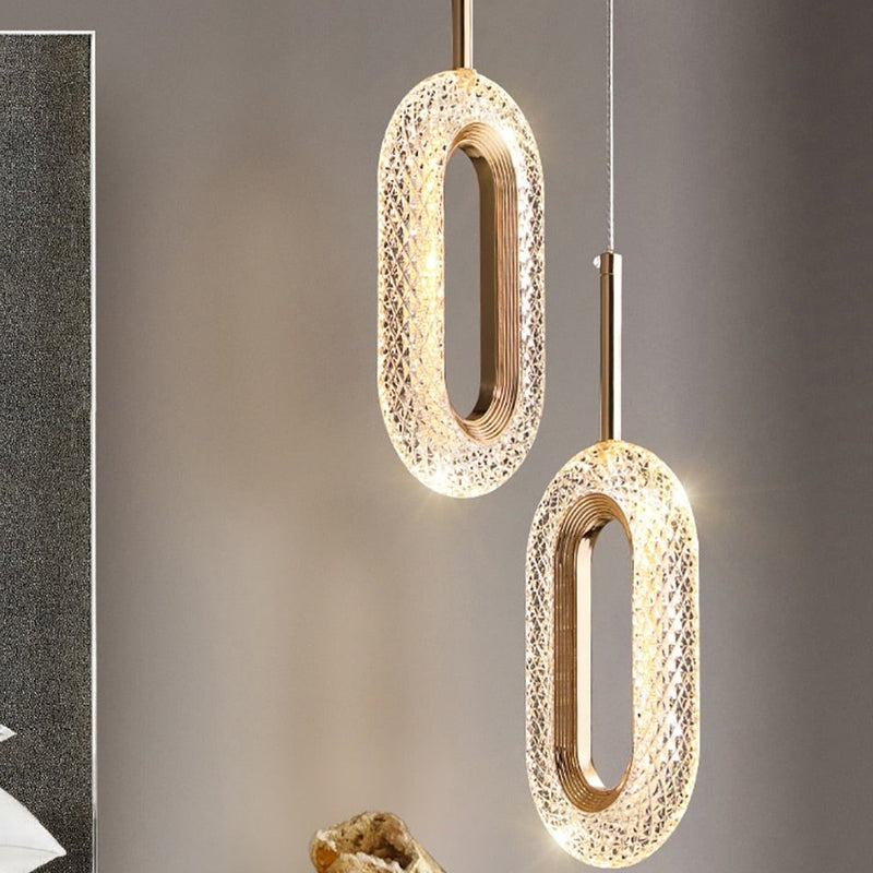 Suspension moderne LED forme ovale et dorée Elaia