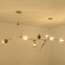 Lustre design à LED moderne doré et noir avec boules en verre et pics