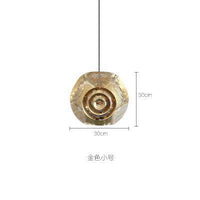 Hollowed gold or silver design pendant light