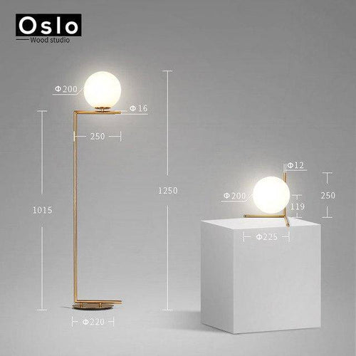 Lampadaire design à LED doré avec boule en verre