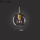 Suspension design LED en verre arrondi au style Loft Industriel
