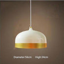 Suspension design LED avec abat-jour en métal arrondi au bords dorés Loft