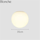 Applique murale LED boule en verre Loft