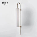 Applique tube en verre et base dorée Room